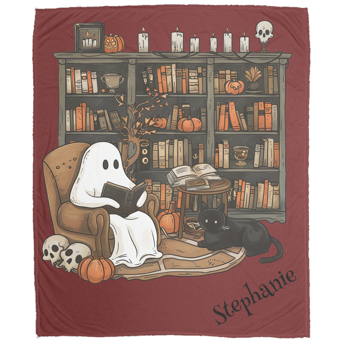 Blanket with ghost reading a book and black cat in front of a bookshelf on a red background.