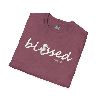 Folded maroon t-shirt with 'blessed' text on a white background