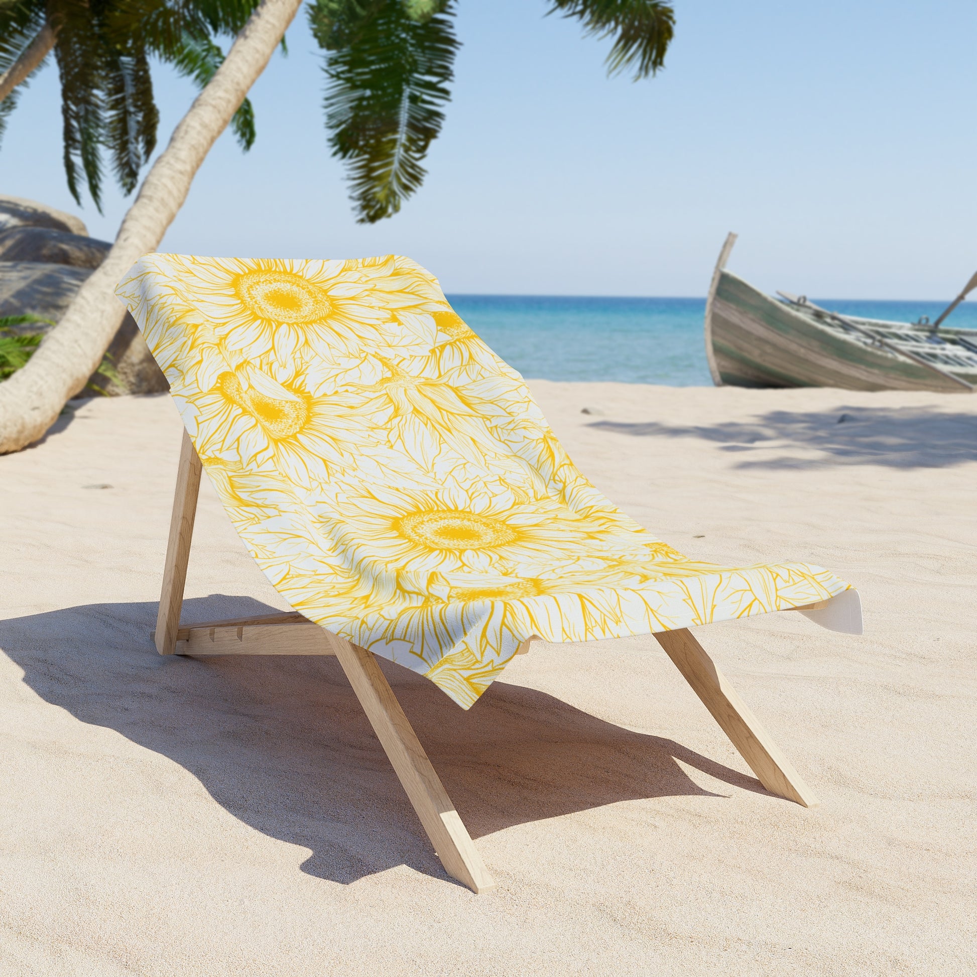 Yellow floral towel on a wooden chair at a beach with palm trees and ocean in the background