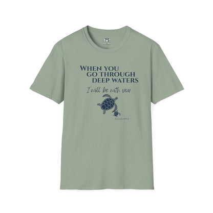 Sage green t-shirt with turtle graphic and motivational quote on a white background