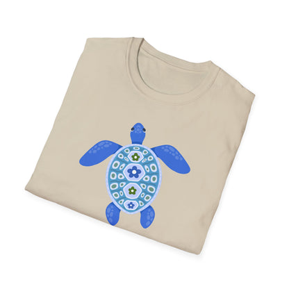 Folded beige t-shirt with a blue turtle design on a white background
