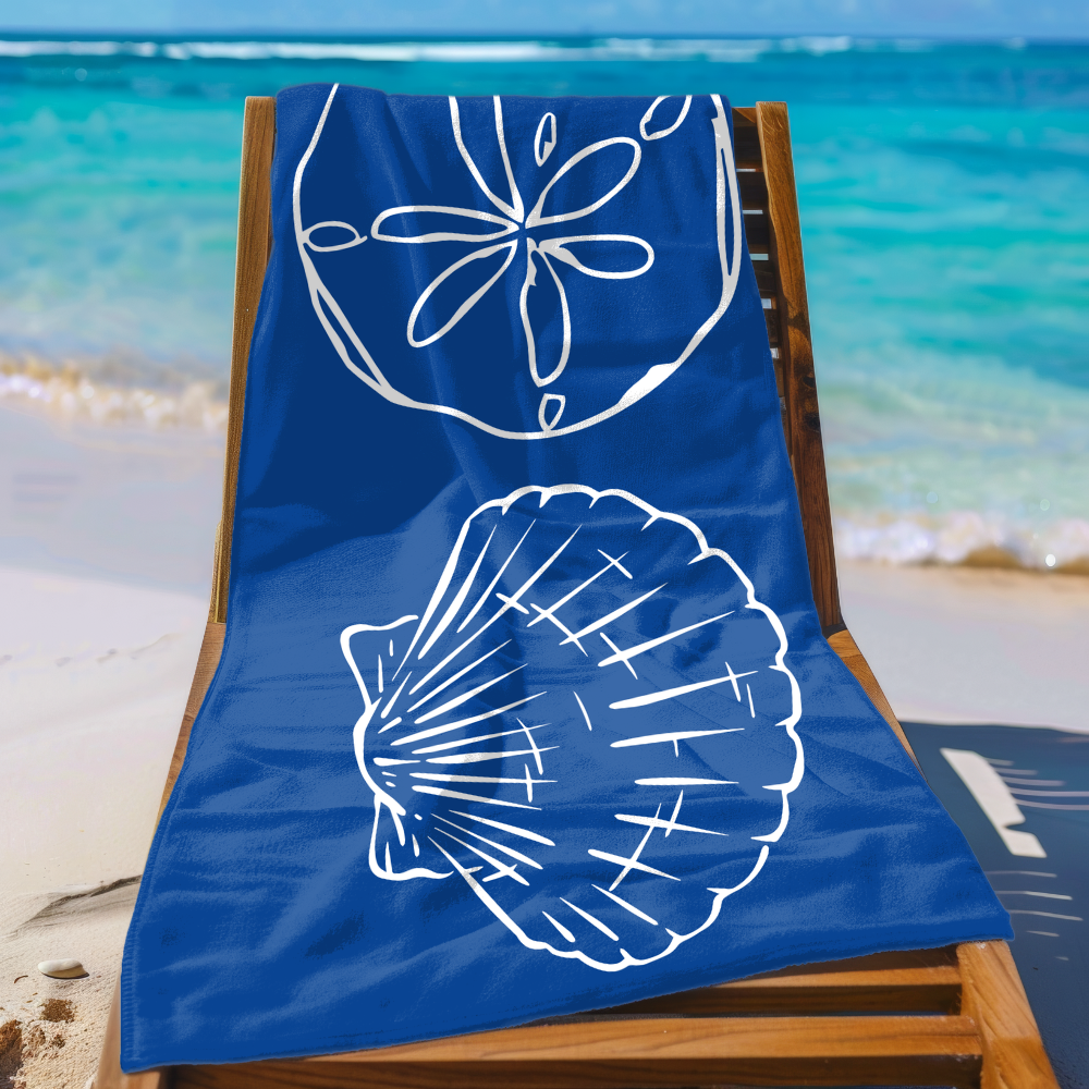 Blue towel with white shell design on a wooden chair at the beach