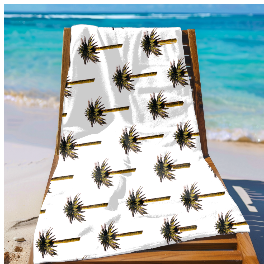 Beach towel with palm tree pattern on a wooden chair at the beach