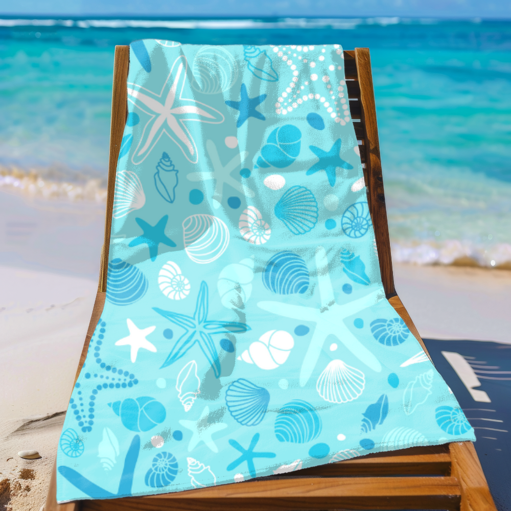Beach towel with sea shell pattern on a wooden chair at the beach