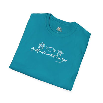 Folded teal t-shirt with white text and graphics on a white background