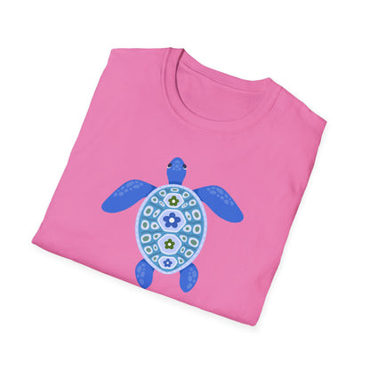 Pink t-shirt with a blue turtle design on a white background