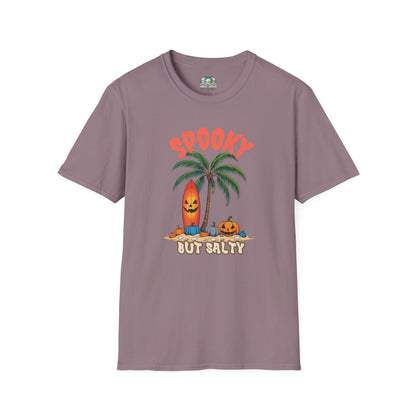 Purple t-shirt with Halloween-themed design featuring a palm tree, jack-o'-lantern, and surfboard on a white background.