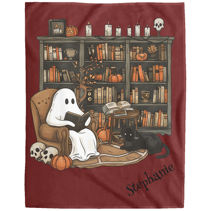 Ghost reading a book with a black cat on a red blanket with 'Stephanie' text