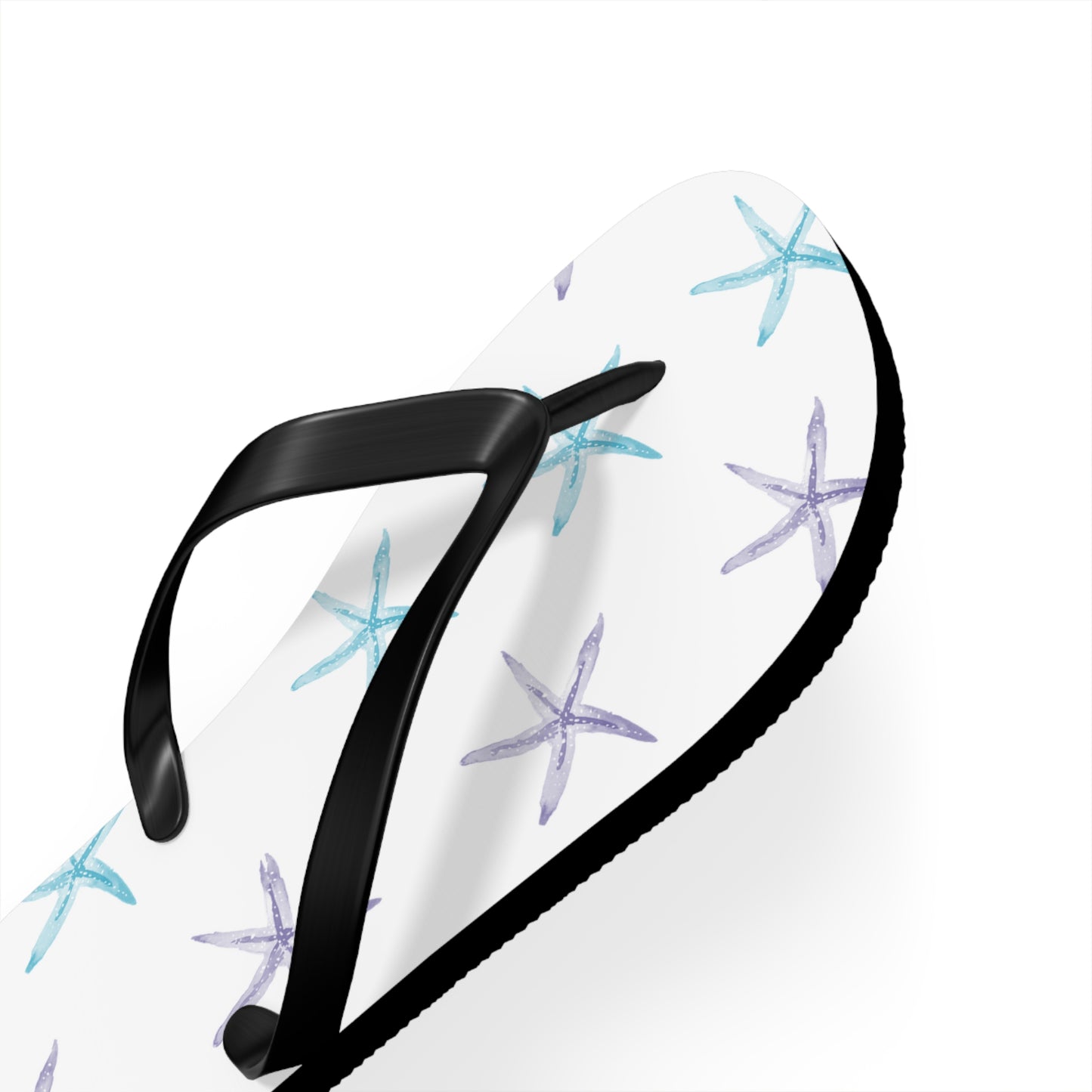 Black flip-flop with starfish pattern on a white background