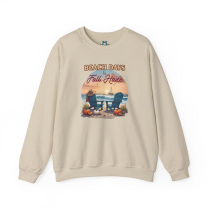 Beige sweatshirt with beach-themed graphic and text on a white background