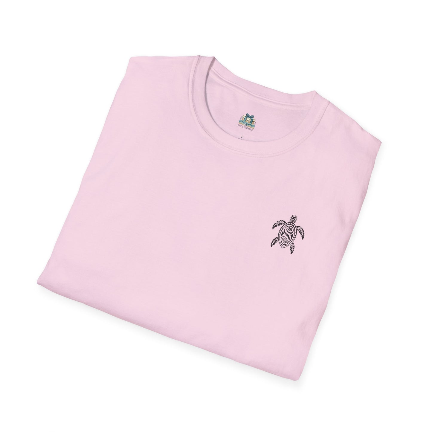 Folded pink t-shirt with a turtle emblem on a white background