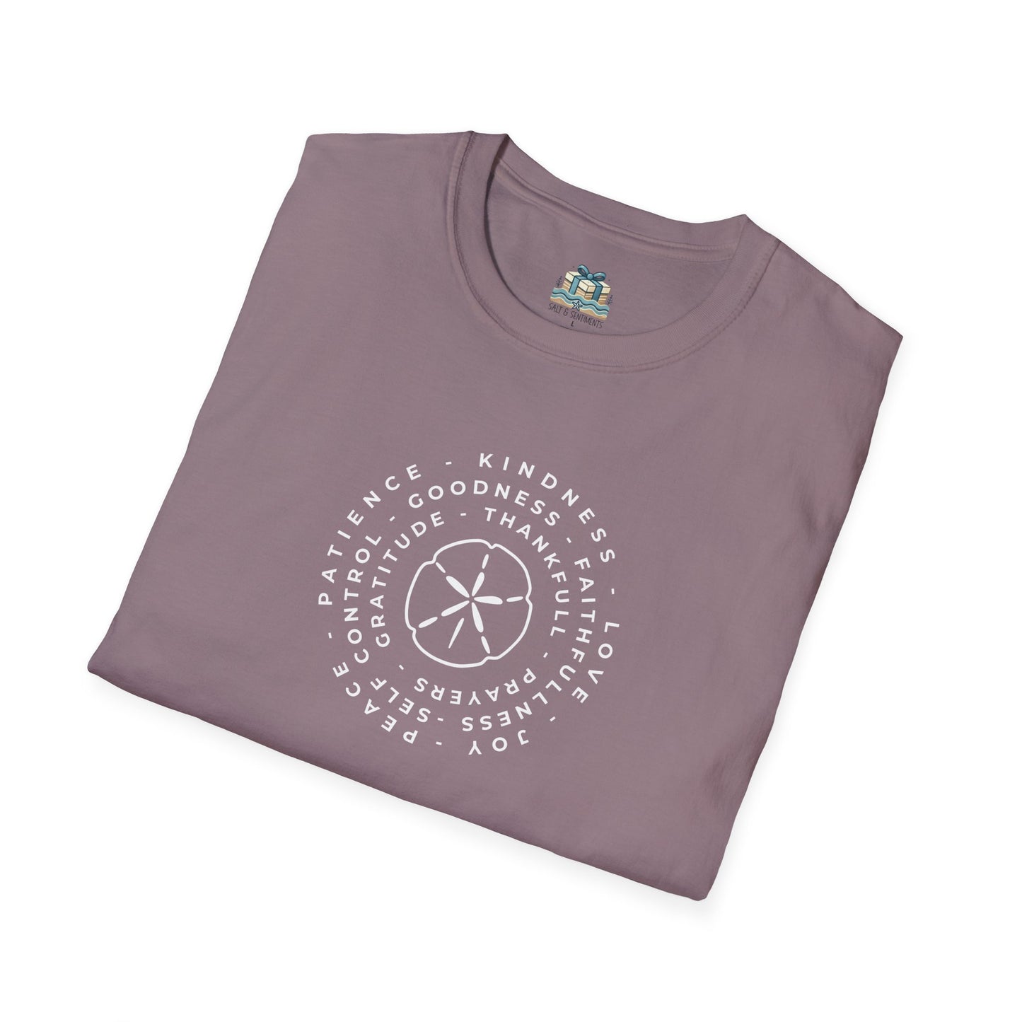 Folded purple t-shirt with text and design on a white background