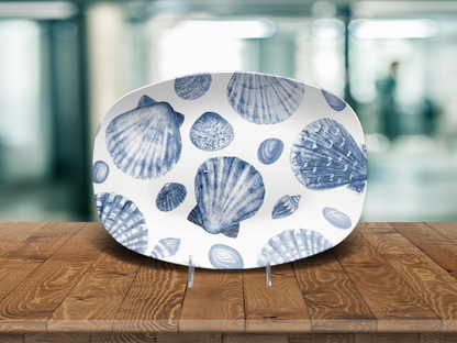 Eco-friendly beach house dinnerware with blue shell print