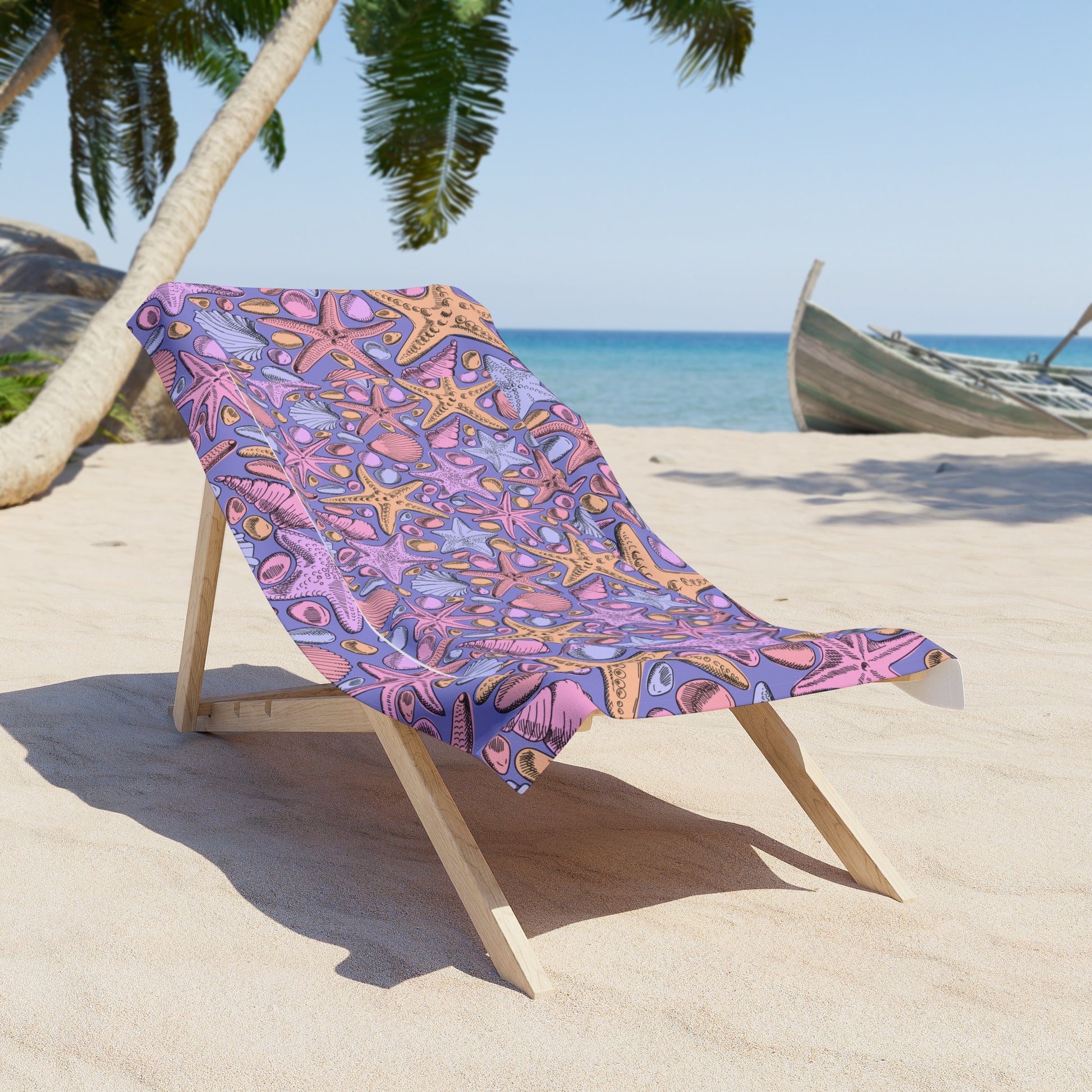 Colorful patterned towel draped over a wooden beach chair on a sandy beach with palm trees and ocean in the background.