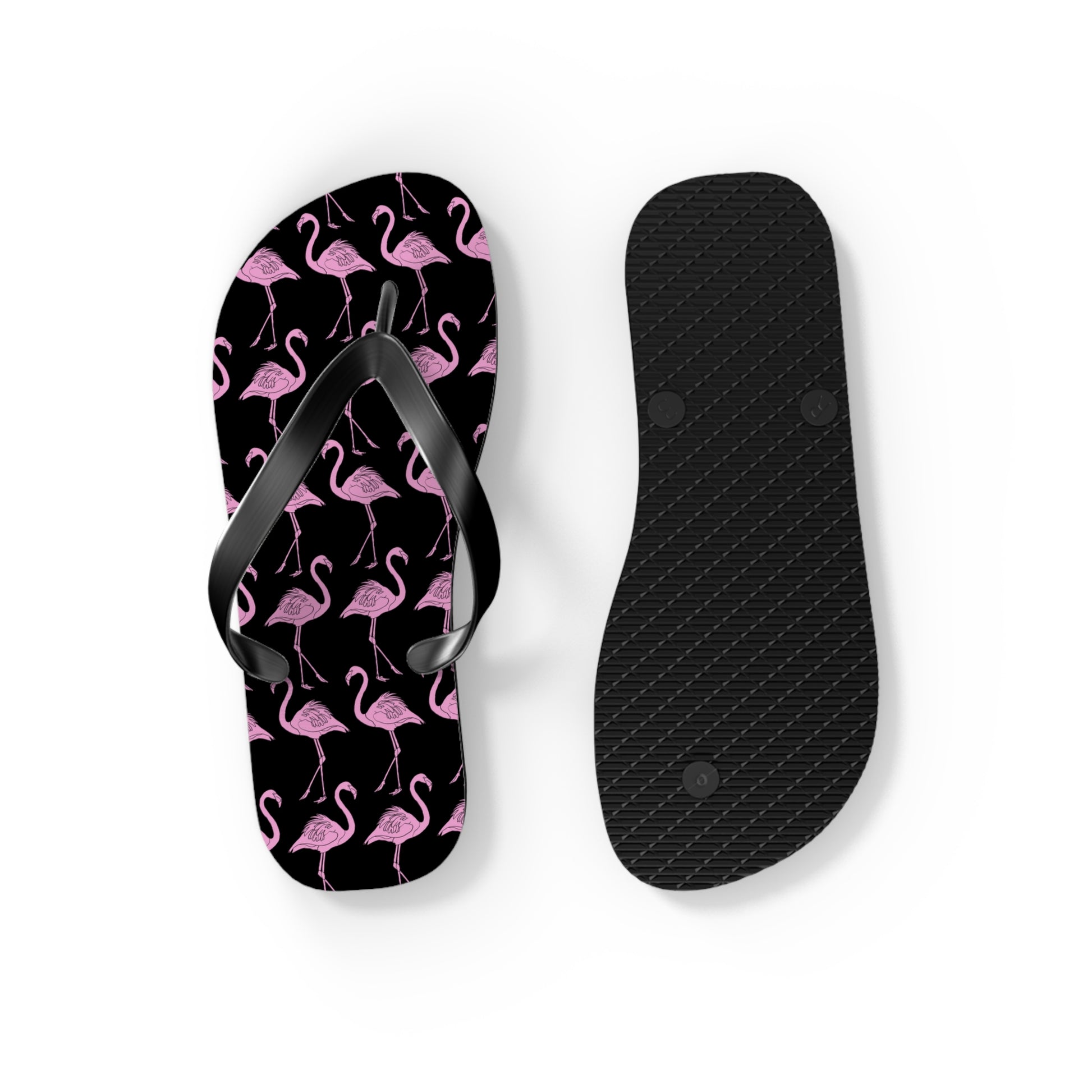 Flip-flop with pink flamingo pattern on a black background