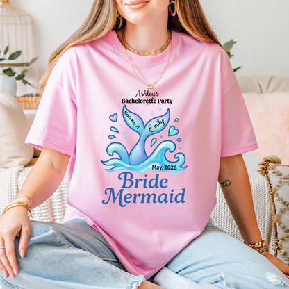 Person wearing a pink t-shirt with 'Bride Mermaid' design and text.
