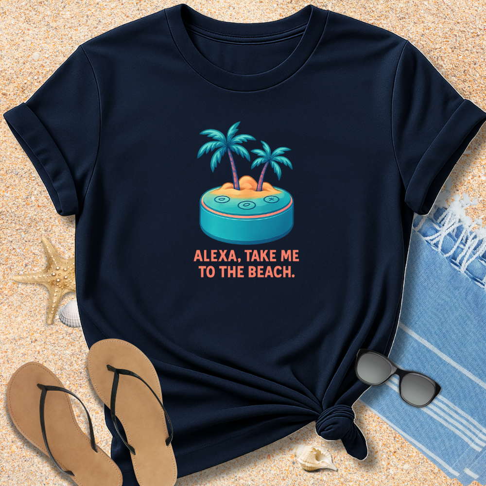 Navy blue t-shirt with beach graphic and text 'Alexa, take me to the beach' on sand with flip-flops and sunglasses.