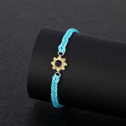 Adjustable braided rope bracelets with sunflower charm design

