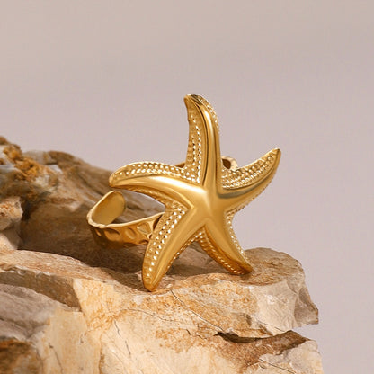 Handmade gold necklace with starfish pendant and beaded chain