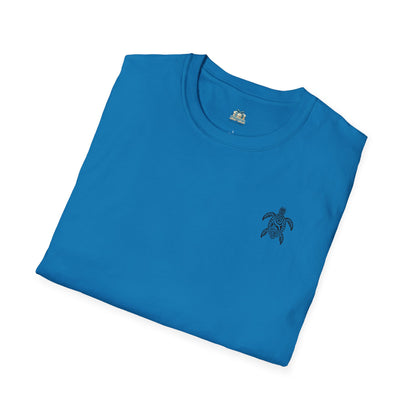 Folded blue t-shirt with a small turtle logo on a white background