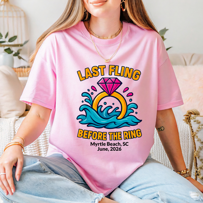 Person wearing a pink t-shirt with 'Last Fling Before the Ring' design.