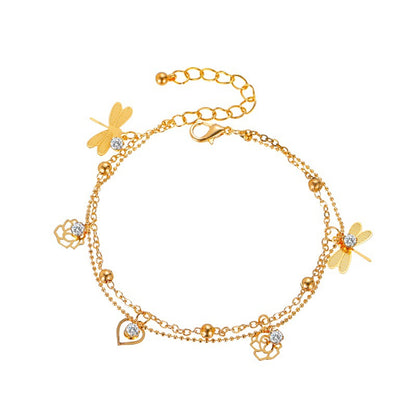 Gold-tone fashion anklet with layered chains and summer details
