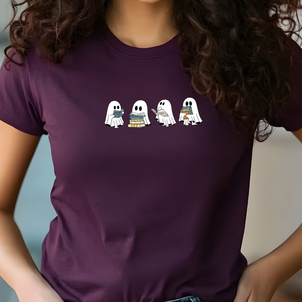 Person wearing a purple t-shirt with cartoon ghosts design.