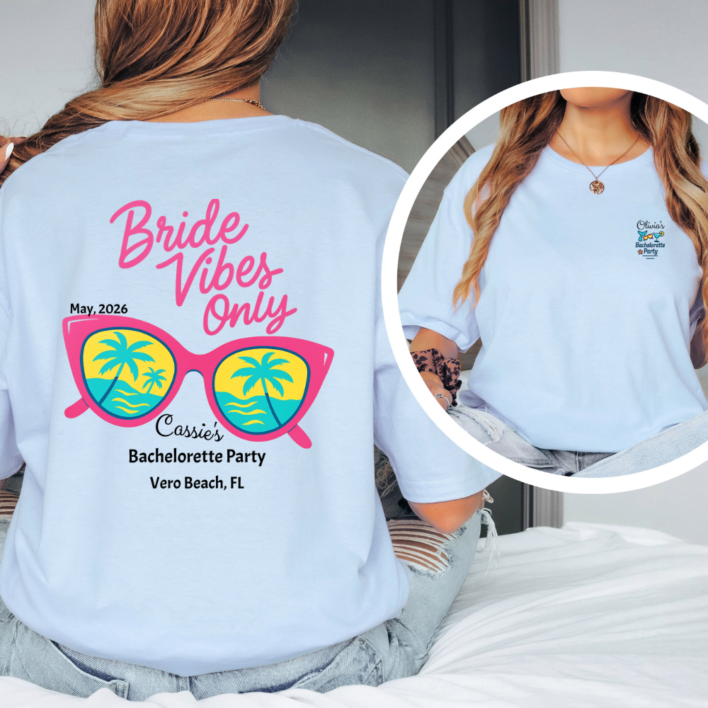 Light blue t-shirt with 'Bride Vibes Only' design on the back, featuring sunglasses and palm trees.