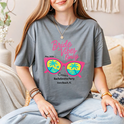 Person wearing a t-shirt with 'Bride Vibes Only' design and personalized text.