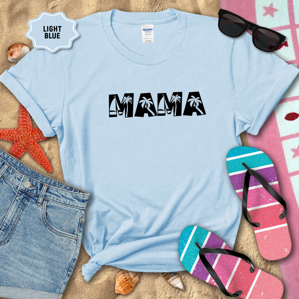 Light blue t-shirt with 'MAMA' print on a sandy background with beach accessories.