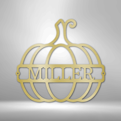 Custom family name pumpkin wall art in gold mild steel.