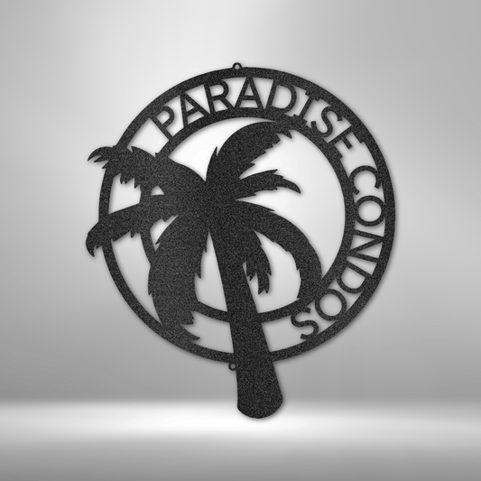 Decorative metal wall art with palm trees and 'Paradise Condos' text on a gray background