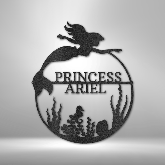 Decorative metal wall art with 'Princess Ariel' design on a gray background