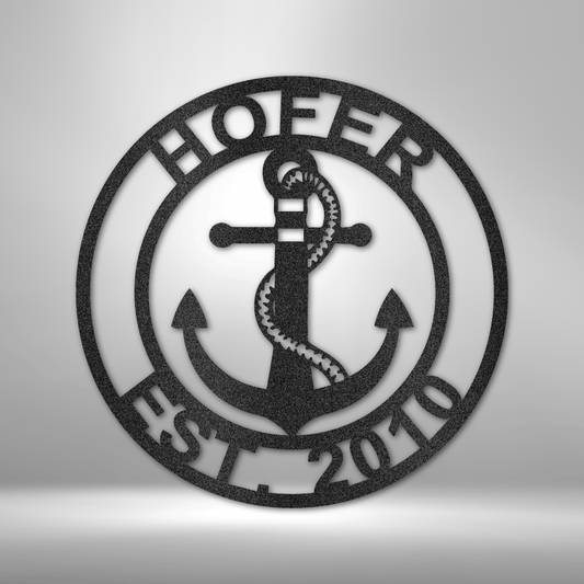 Decorative metal wall art with anchor design and 'HOEER EST. 2010' text on a gray background