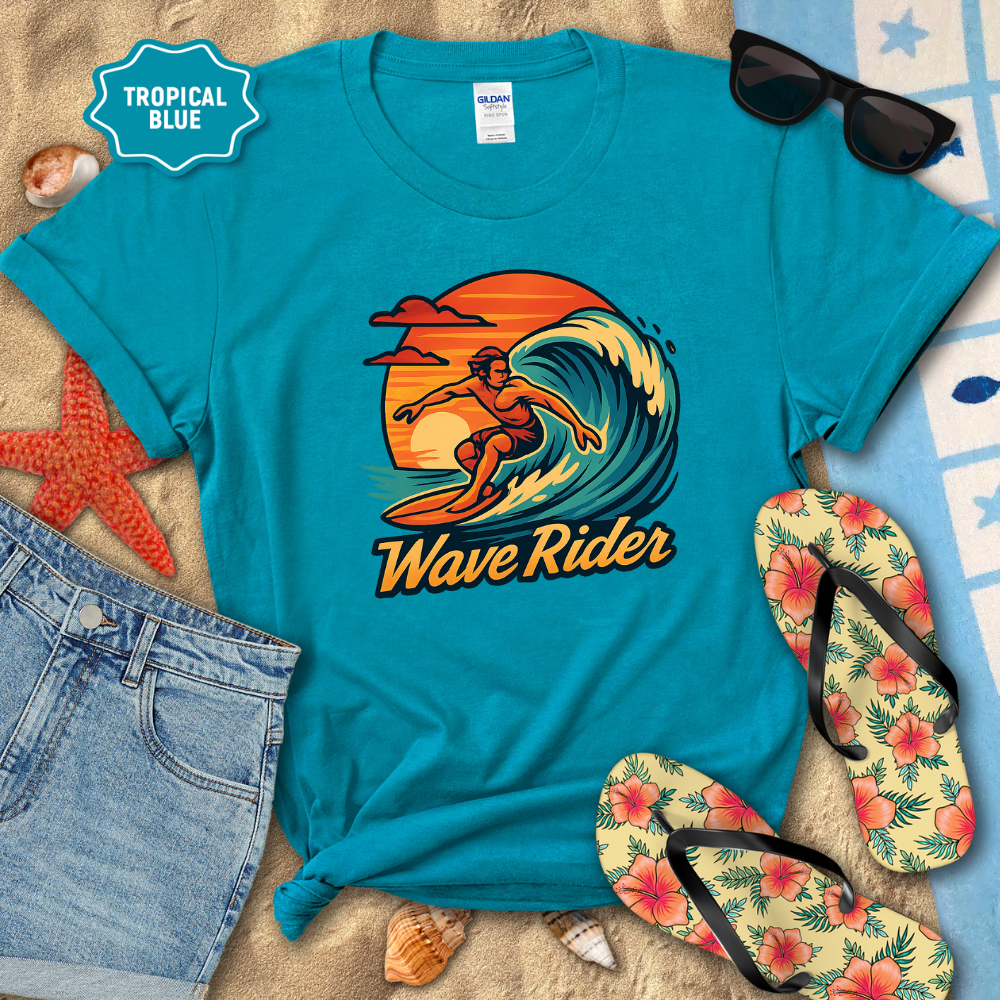 Blue t-shirt with 'Wave Rider' design on a beach setting with sunglasses, flip-flops, and starfish.