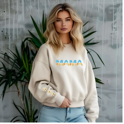 Beige beachy MAMA sweatshirt with sand and sea-themed letters and starfish on the sleeve, cozy and stylish gift for moms.