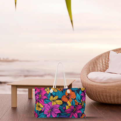 Oversized beach bag with bold tropical floral design in pink, orange, yellow, and teal