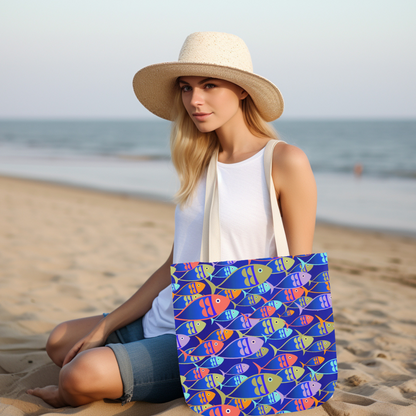 Tote bag featuring colorful fish pattern on a deep blue background with white handles, size 18x18 inches.
