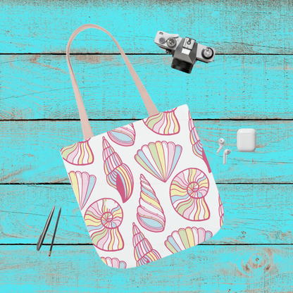 18x18 tote bag with pastel seashell pattern on white background, light tan handles, displayed on turquoise wood backdrop.