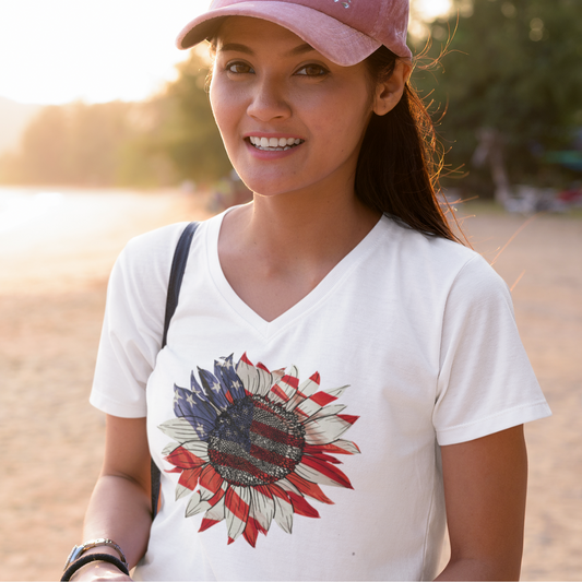 Woman wearing a white V-neck t-shirt with a sunflower graphic in the design of the American flag