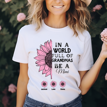 Smiling woman wearing a white t-shirt with pink sunflower and customizable "Be a Mimi" quote, featuring grandkids’ names below

