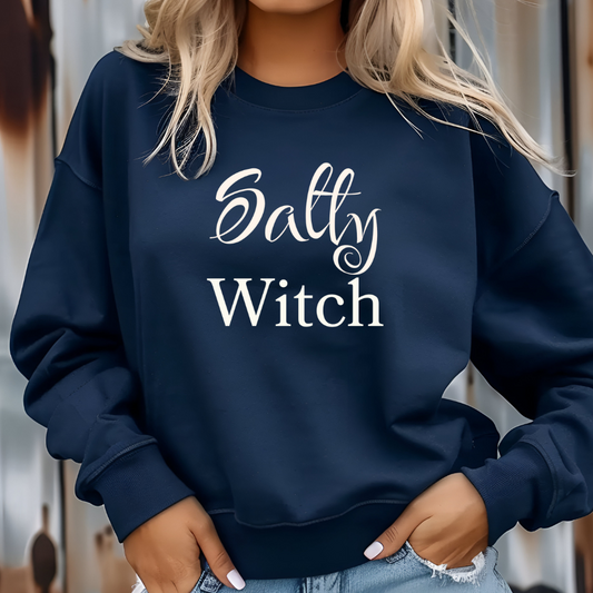Navy blue sweatshirt with 'Salty Witch' text worn by a person.