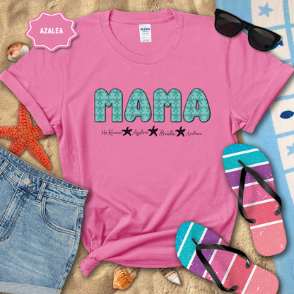 Pink t-shirt with 'MAMA' text on a beach-themed background