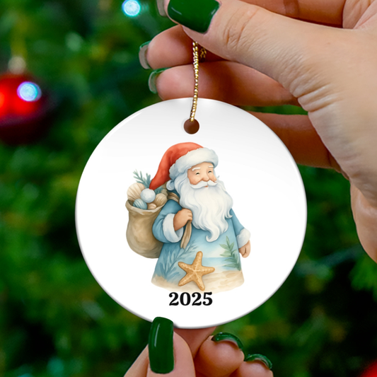 Decorative Christmas ornament with a Santa Claus design and '2025' on a blurred Christmas tree background.
