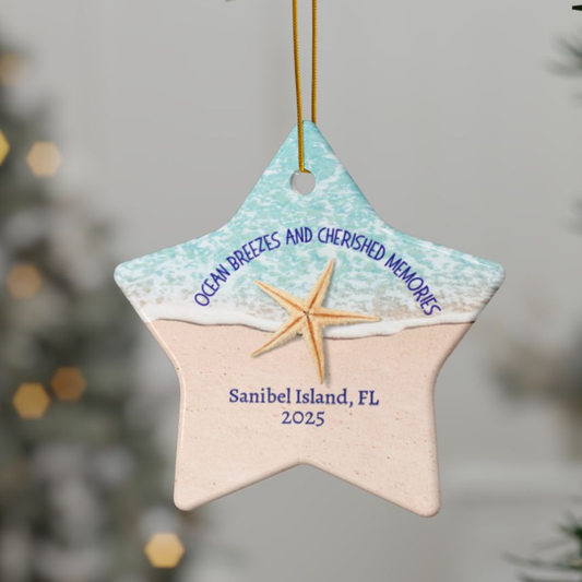 Star-shaped ornament with a starfish, text 'Ocean breezes and cherished memories', 'Sanibel Island, FL', and '2025' on a blurred background.