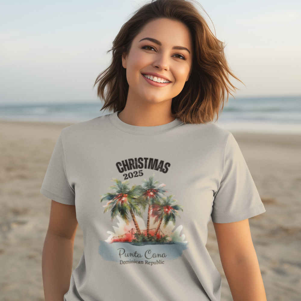 Woman wearing a Christmas 2025 Punta Cana t-shirt on a beach