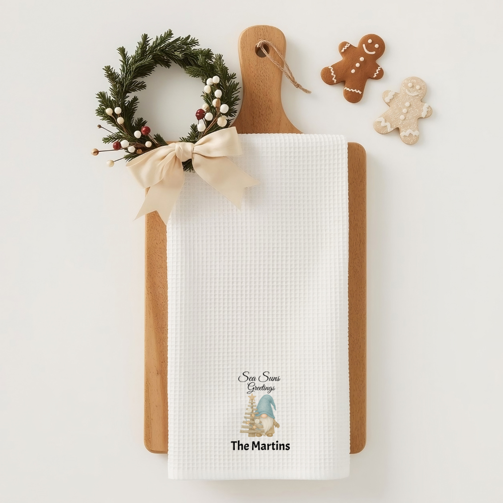 Personalized towel with Christmas design and wreath on a white background