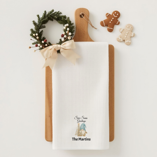 Personalized towel with Christmas design and wreath on a white background