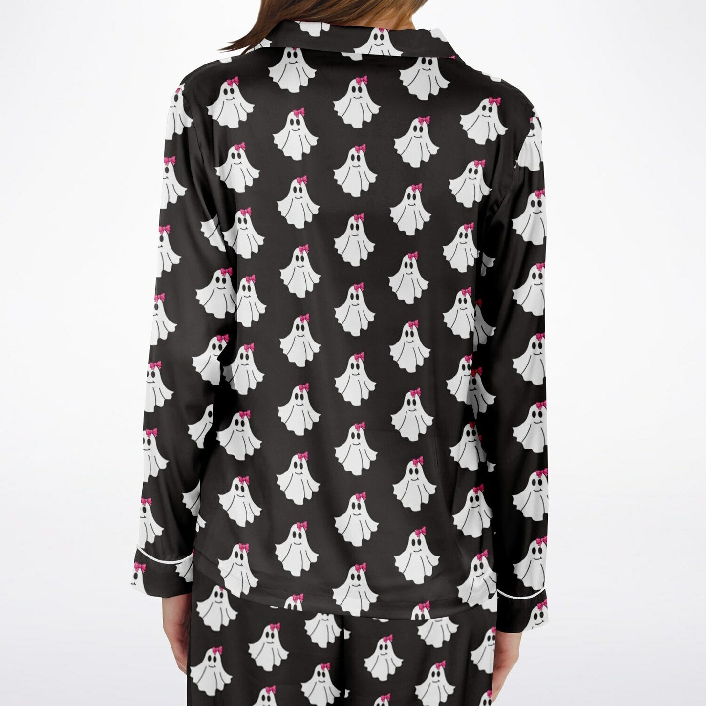 Black pajama top with white ghost pattern on a white background