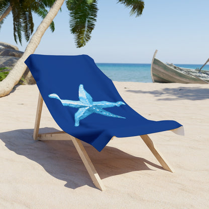 Coastal navy towel with quick-dry cotton-poly blend on beach chair